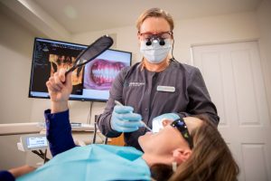 Dental Hygienist, Christine, caring for a patient.