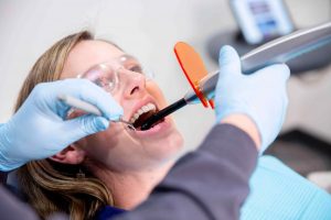 patient undergoing a restorative service